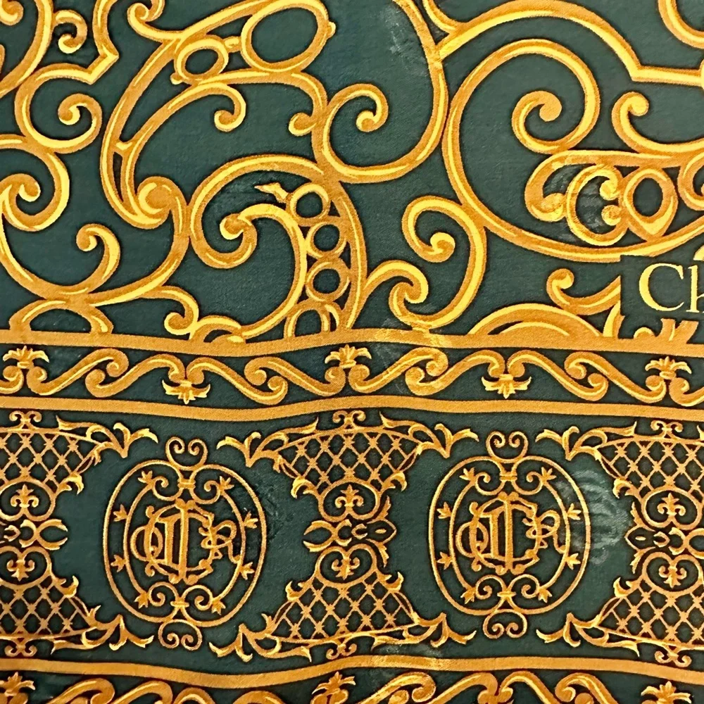 Vintage Dior silk scarf with hidden logo 35x35”rolled hem. Tag on side.